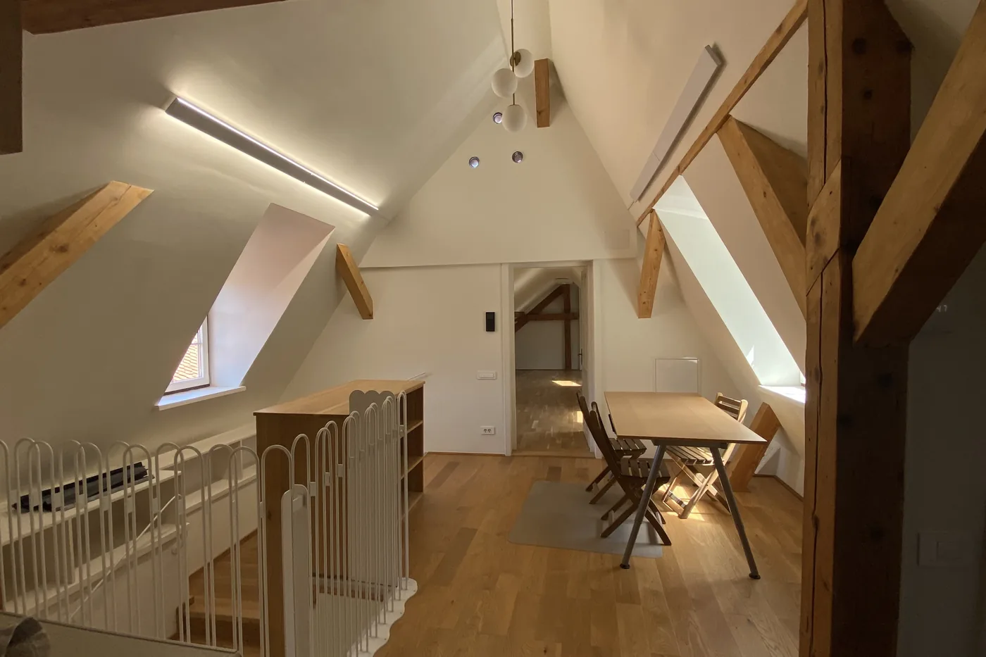 Apartment 9 seen along the roof ridge, with the stair gallery